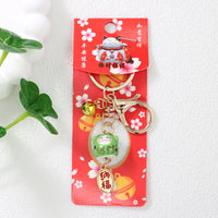 Japanese Lucky Cat Ceramic Keychain with Bell - Sakura Charm for Bags & Gifts