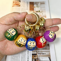 Japanese Daruma Doll Keychain with Bell, Resin Lucky Charm for Bags and Keys