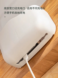 Wall-Mounted Remote Control and Phone Holder with Charging Port