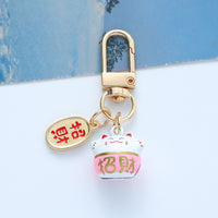 Japanese Lucky Cat Keychain Charm with Hollow Bell for Bags and Accessories