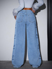 Y2K High-Waisted Washed Denim Jeans with Bow Detail
