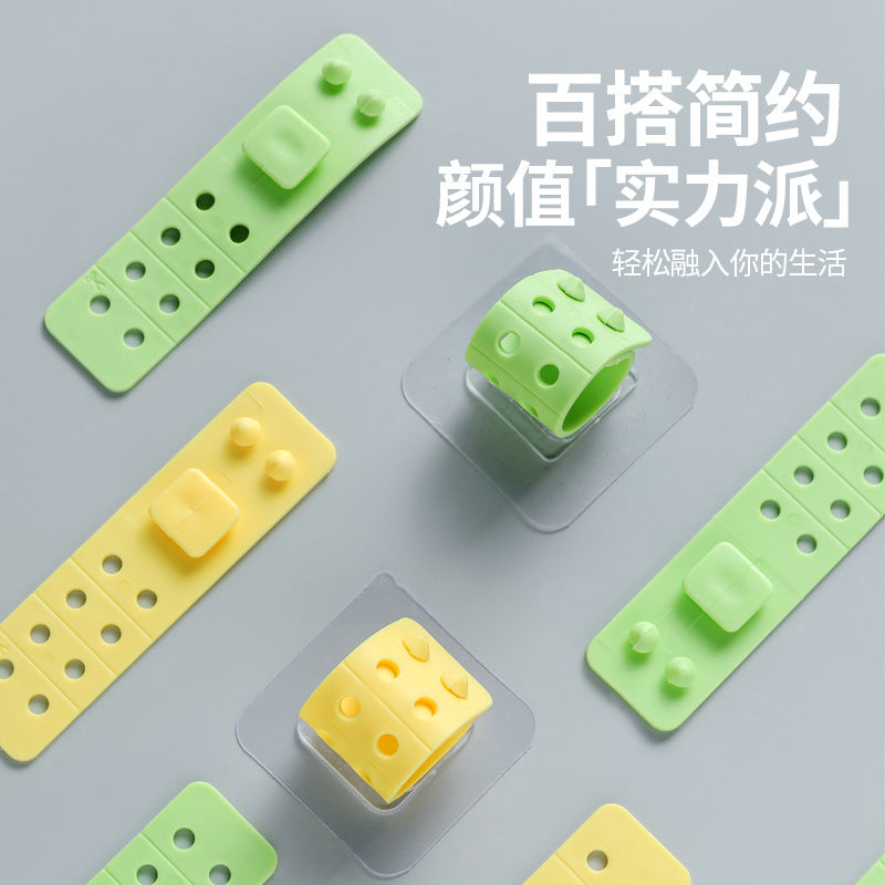 Multi-Purpose Storage Strap for Mop and Cable Organization
