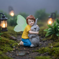 Boy Fairy Hugging Rabbit Statue Illuminate in the Dark Fairy Boy with Rabbit
