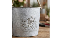 Distressed White Hanging Flower Pot Bird Motif Iron Flower Pot Rope Handle Metal Bucket Planter Printed Text