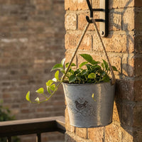 Distressed White Hanging Flower Pot Bird Motif Iron Flower Pot Rope Handle Metal Bucket Planter Printed Text