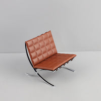 Modern Minimalist Stainless Steel Candy Storage Jar with Lid and Leather Chair Decor
