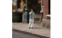 Thoughtful Pose Miniature Figurine Curly-Haired Hand-Painted Figurine