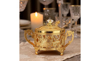 Ornate Condiment Jar with Spoon Gold-Tone Sugar Bowl with Lid Vintage Glass Condiment Pot with Metal Frame Elegant for Hosts