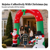 Red and Green Santa Snowman Arch Snowflake Print Inflatable Christmas Arch Festive Outdoor Christmas Decoration Stable Support