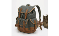 Waxed Canvas Backpack Rugged Canvas Rucksack with Leather Trim Vintage Backpack with Buckle Straps for Journeyers, Students, Travel, Commuting