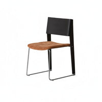 Upholstered Chair with a Curved Backrest Modernist Inspired Dining Room Furniture Padded Seat Ergonomic Design for Homeowners
