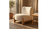 Cushioned Upholstered Lounge Chair Textured Textile Sleek Outline Lounge Chair Rounded Modern Single Sofa Solid Base