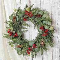 Christmas Wreath with Red Berries, Pine Cones, and Pine Needles