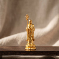 Brass Ksitigarbha Bodhisattva Statue Gold-Toned Ksitigarbha Figurine with Rod Miniature Statue with Lotus Base Tabletop for Buddhists, Practitioners, Home Altar, Meditation Room, Shrine
