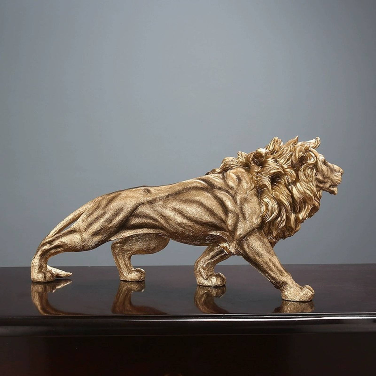 Lion Statue with Golden Finish Antique Lion Figurine Elegant Sculpture for Art Collectors